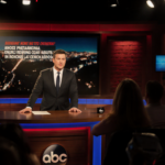 Jimmy Kimmel speaking confidently at his desk with the ABC logo behind him and a news ticker scrolling Trump criticism