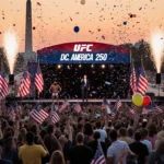 President holds microphone with confetti and fireworks on National Mall stage celebrating patriotic 250th