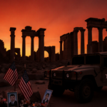US military vehicle parked near memorial with American flags and ancient ruins at dusk