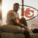 Patrick Mahomes sits on a hospital bed with his knee propped and the Kansas City Chiefs logo behind him under a golden glow