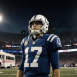 Philip Rivers stands at Lucas Oil Stadium with neon lights on his helmet behind the sky.