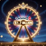 Giant Powerball jackpot wheel glowing with $1.7 billion display against dark blue night sky with swirling golden stars.