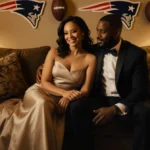 Ann Michael Maye sits on plush couch with Patriots memorabilia and footballs showing team spirit