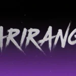 ARIRANG album art glows with bold typography against purple-silver gradient background with subtle Korean patterns