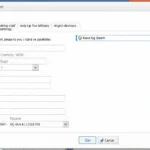 Person typing on laptop with notebook and pen on desk