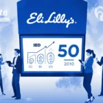 Traders gather around screen showing Eli Lilly logo with IBD 50 ranking and phones while analysts discuss market data