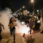 Family with six children running from ICE raid with tear gas smoke behind them and protest signs glowing