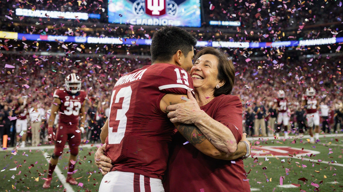 Fernando Mendoza embraces his mom Elsa with confetti swirling around them on the college football championship field.