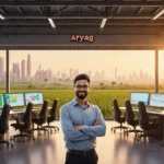 CEO standing with rows of computer screens showing crop data and financial analytics in a warehouse lit with warm golden ligh