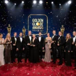 Celebrities walk the Golden Globes red carpet with golden statues and champagne glasses