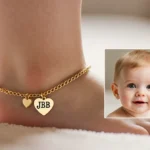 {“title”:”Hailey Bieber Unveils Anklet Honoring Baby Jack”,”body”:”> **At a Glance**
> – **Hailey B