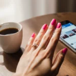 Hero Image: A beautifully styled photo of a hand with a vibrant, long-lasting Polish manicure. The nail polish is applied to