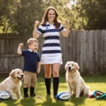 Kate Middleton playing rugby with Prince George and two golden retriever puppies on a sunny lawn