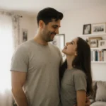 Katherine LaNasa smiles with her children Henry and Eloise in cozy living room with family photos on wall