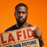 Concerned LA resident holds LAFD Fund Our Future sign with bright orange background and urgent expression