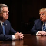 Senator Lindsey Graham confronting Donald Trump with stern expression and crossed arms at wooden desk