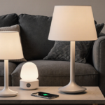 Lamps glowing with wireless charging pads and throw pillows on a sleek sofa in a cozy living room