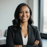 Michele Corriston stands confidently at desk with SiriusXM radio and book showing her media career journey
