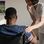 Caregiver holds former NFL player