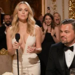 Nikki Glaser roasting Leonardo DiCaprio at golden awards show with Leo looking uncomfortable and crowd reacting