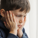 AI chatbot refusing to depict a minor in a distressing scene with an offer of assistance.