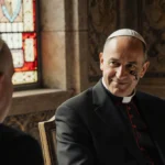 Prince Albert of Monaco meets Pope Leo at Vatican with facial scar visible and warm light through stained glass