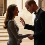 Prince William opening door for Kate Middleton with palace steps behind and golden light on both figures