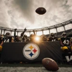 Steelers players celebrate victory with abandoned field goal and mid‑air 2‑point attempt near glowing logo