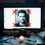 Computer screen glows with a distorted portrait of Matthew Hardy and red X marks harass while a flickering candle casts light