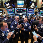 Traders huddled around screens showing silver prices dropping and a graph flashing a 15% crash while phones buzz with texts