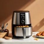 TriZone air fryer sits on counter with golden chicken and wooden basket showing crispy results