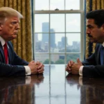 President Trump sits across from Nicolás Maduro at wooden table with Minneapolis skyline visible through window behind