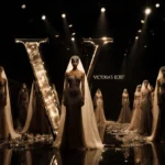 Models prepare backstage at Victoria