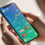 Hands holding smartphone showing XRP price chart with 42 new millionaire wallet icons in blue-green gradient, soft natural li